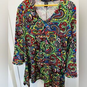 Win Win surplice stretch dress with a bohemian paisley print. Size L